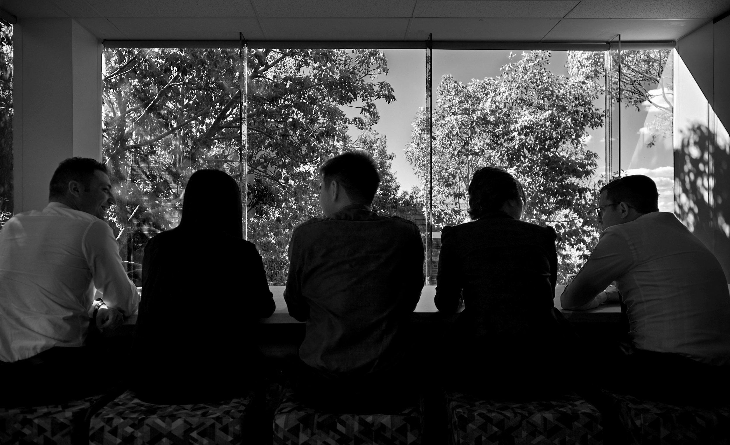 Green & Sternfeld staff at lunch, black and white photograph